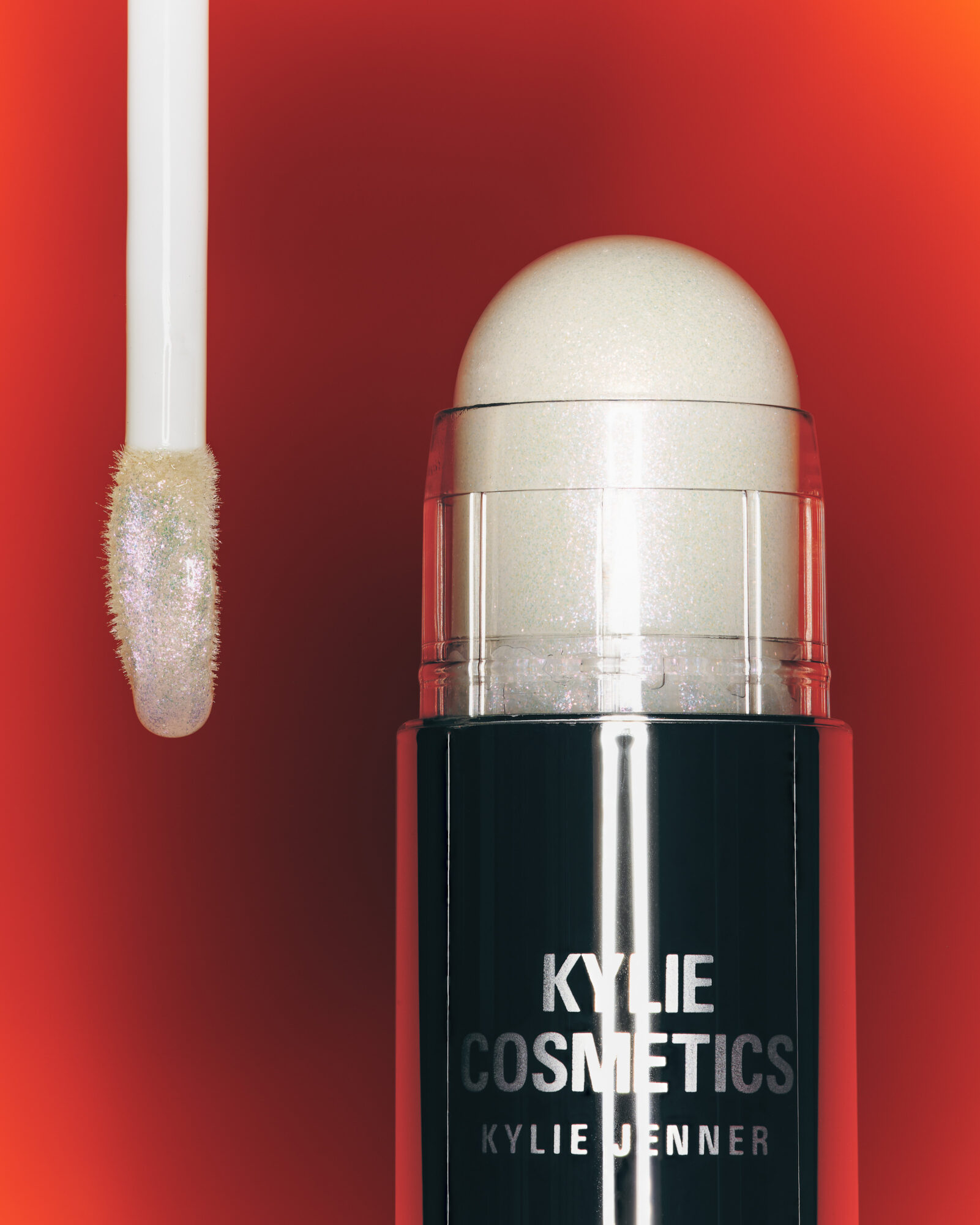 Kjc Cosmic 2 0 Makeup 25 Lip Glaze Pink Ice Dewy Balm Stick Solar Glow Orange Background Cp 112 Hero